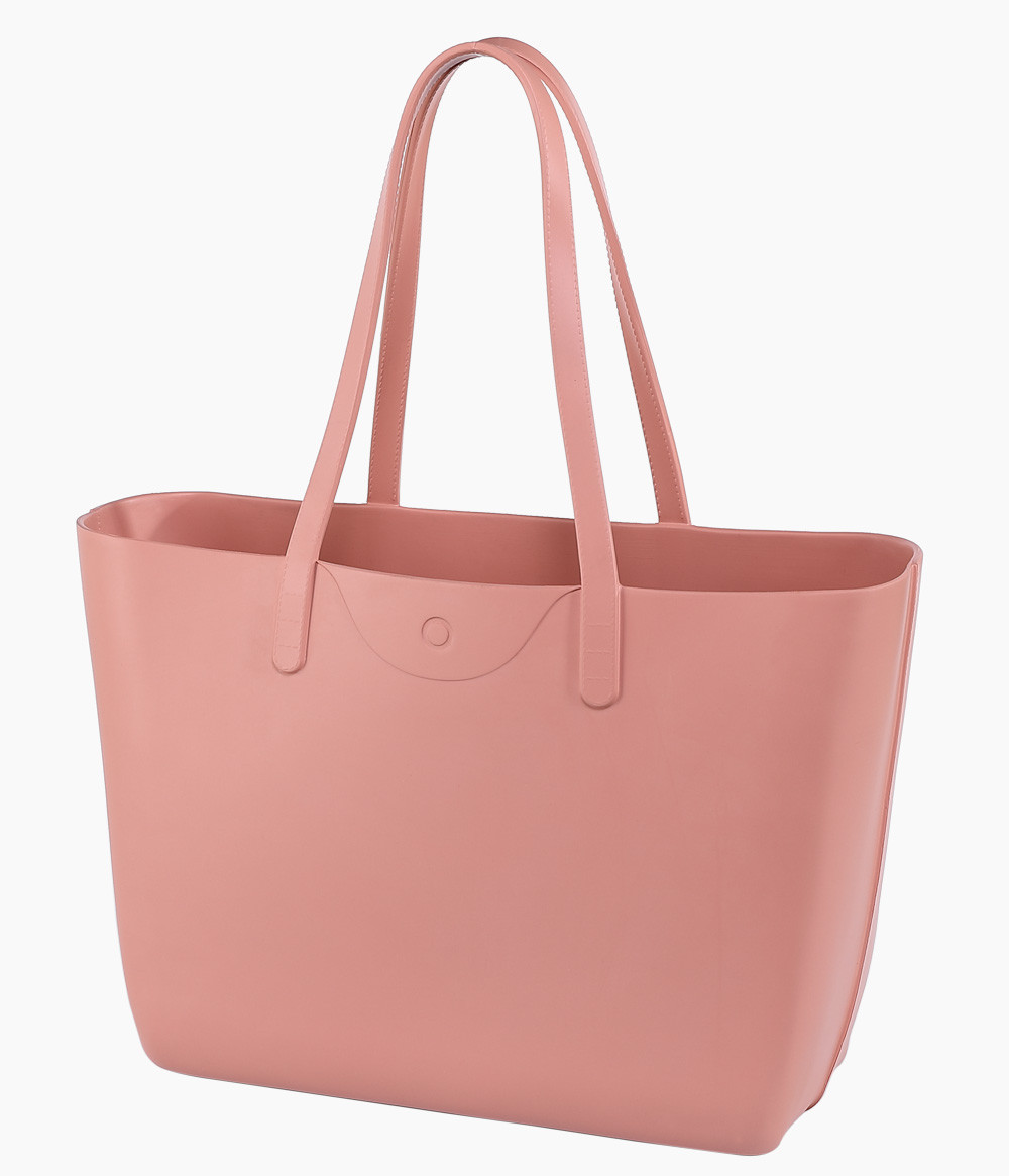O bag Icon Pesca rosa shoppingväska i EVA-material med långa handtag. Framsida